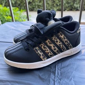 Girls black and gold cheetah print k-Swiss shoe . Girls size 11